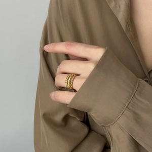 Elegant gold multi-layer twisted rope ring featuring a minimalist three-tier design for women