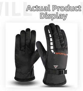 Detail of windproof winter sports gloves featuring anti-slip palms and reflective logos
