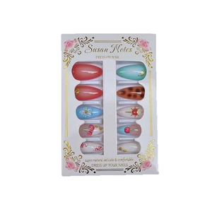 Press-on nail set with 3D cherry and leopard patterns on French almond-shaped nails