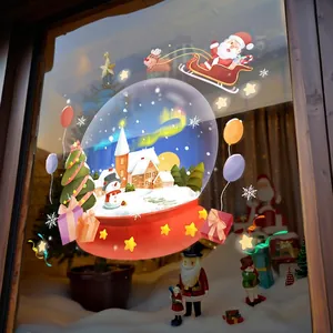 Autocollants de Noël avec Père Noël, rennes et scène festive de boule à neige
