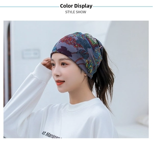 Close-up of multifunctional knit neck warmer with purple abstract floral patterns