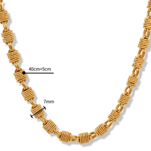 Macro view of gold-plated knot chain necklace with 7mm width and adjustable 45cm length
