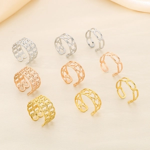 Set of minimalist stainless steel open rings with heart and hollow geometric textures