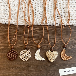 Bohemian woven heart and moon necklace collection with wooden beads and long brown cord