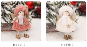 Detail view of plush Christmas angel ornaments in pink and white with sequin details