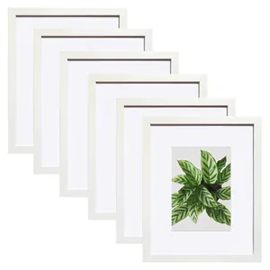 Set of 6 minimalist white photo frames for wall gallery with a botanical art print