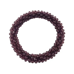 Elegant purple beaded hair tie with small crystal beads on a clean white background