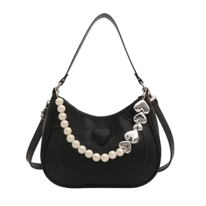 Chic black faux leather crossbody bag with 3D heart detail and pearl metal strap