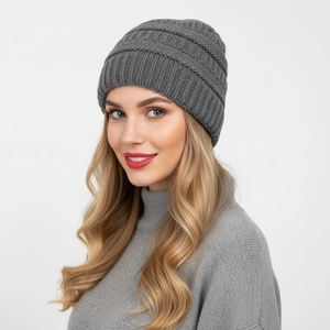 Detailed close-up of dark grey thick ribbed knit beanie with windproof satin lining