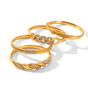 Set of four 18k gold plated stainless steel bracelets with crystals in a stackable design