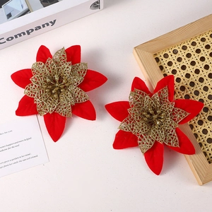 Artificial velvet Christmas Poinsettia flowers in red and gold for holiday home decor
