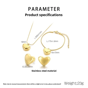 Polished golden stainless steel heart jewelry set with necklace, bracelet, and earrings