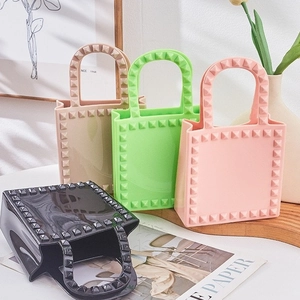 Fashionable PVC jelly bucket handbags with rivet details in four assorted colors