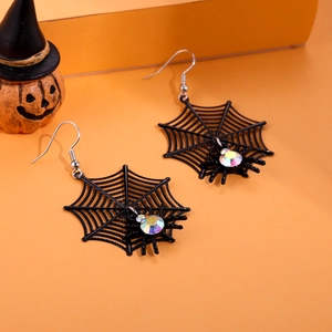 Halloween black spider web drop earrings with iridescent crystals on orange background