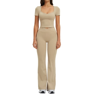 Women's yoga set with U-neck crop top and high-waisted flared leggings in light khaki color