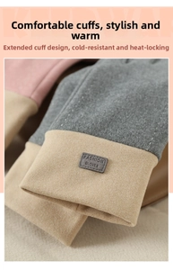 Detail of winter thermal gloves with long wrist design and fashion label texture