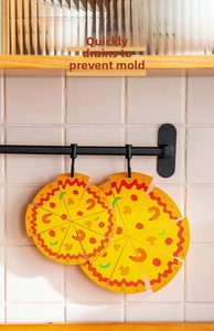 Detail view of two pizza-shaped PVC heat insulation mats hanging on a kitchen rack