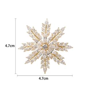 Broche flocon de neige rotative dorée avec cristaux brillants taille 4,7cm élégante