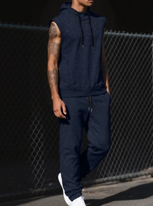 Detail of navy blue sleeveless hoodie set with marble texture and athletic drawstring