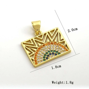 Detail of gold rectangular pendant with rainbow zircon inlay and size dimensions