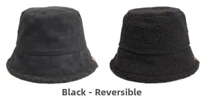 Reversible black bucket hat showing suede and sherpa fleece textures for winter