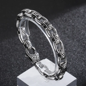 Vintage stainless steel bracelet with engraved S-pattern on 12mm square links