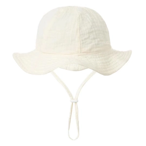 Detail of breathable cream cotton gauze baby sun hat with ruffle brim and chin strap