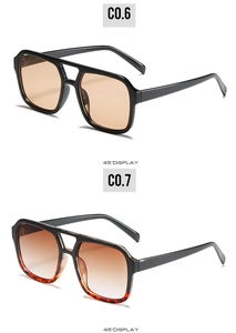 Detail view of retro square double-bridge sunglasses in black and tortoiseshell colorways