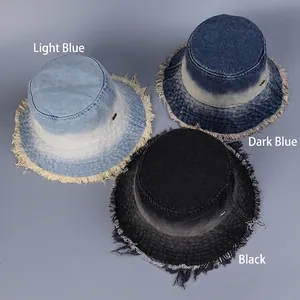 Frayed denim bucket hats in light blue, dark blue gradient, and black with metal logo