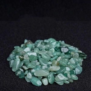 Macro view of polished green aventurine tumbled stones for home garden and aquarium decor
