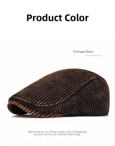 Detail showing the vintage navy knitted fabric texture and dual-tone pattern of this flat cap