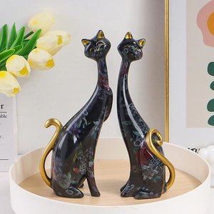 Colorful floral pattern ceramic cat sculptures with gold accents for home decor