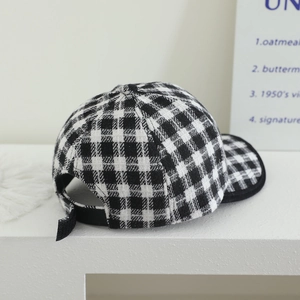 British style black and white checkered wool baseball cap with embroidery and brim piping