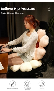 Detail of pink flower plush chair cushion with soft petal design for office and home use
