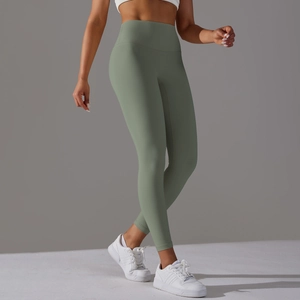 Vue latérale du legging de yoga taille haute vert haricot avec effet galbant fessier