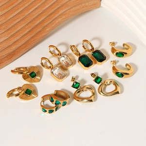 Golden titanium steel heart earrings with emerald zircon stones in a retro collection
