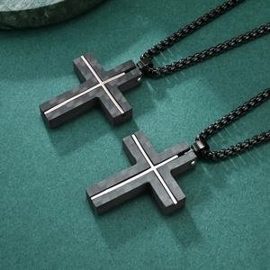 Men's carbon fiber cross pendants in black with silver and rose gold metal details