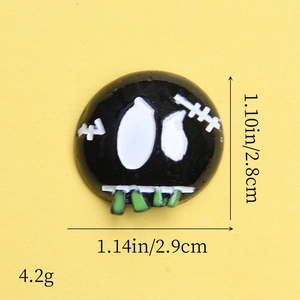 Macro shot of resin ghost charm showing dimensions 2.8x2.9cm for Halloween DIY crafts