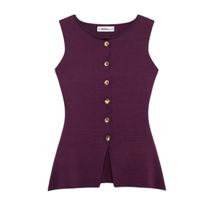 Detail of dark purple knit vest featuring elegant gold buttons and side slit hem design