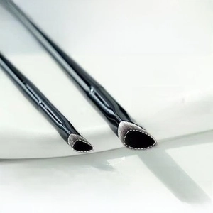 Detail of A205 and A206 flat concealer brushes with black handles and angled fibers