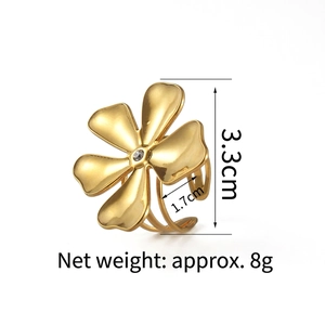 Detailed view of gold flower ring with rhinestone showing dimensions 3.3cm and 1.7cm