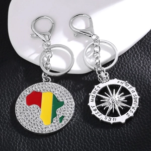 Hip hop alloy keychain featuring African map pendant and vintage sun wheel compass charm
