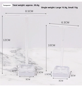 Macro view of clear acrylic T-bar earring stands with height measurements and dimensions