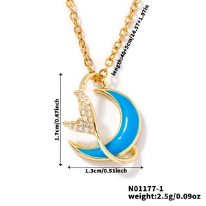 Detail view of blue enamel moon pendant with cubic zirconia and gold chain dimensions
