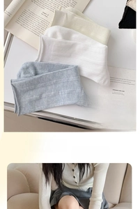 Close-up of breathable knit ribbed texture and elastic cuffs on these thin cotton socks