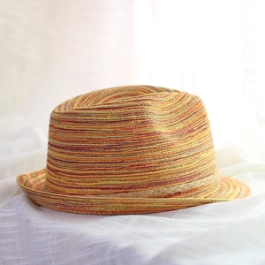 Women's British style striped straw sun hat with woven rope detail for summer travel