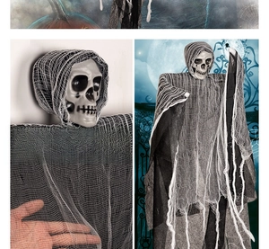 Macro view of realistic skull head and tattered gauze textures for Halloween spooky decor