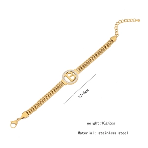 Detail of gold stainless steel letter B bracelet with zircons and size specifications