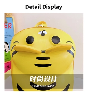 Detailed close-up of a 3D yellow cartoon tiger backpack for kids with a hard shell finish