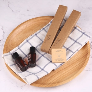 Eco-friendly hotel amenities set with bamboo toothbrush soap and shampoo in kraft packaging